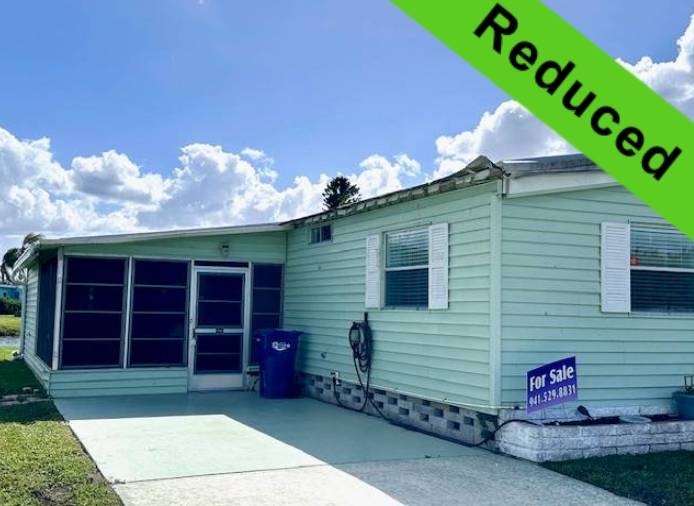 Ellenton, FL Mobile Home for Sale located at 7703 Lakeshore Dr Colony Cove